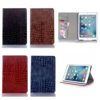 plånbok fodral med kortplatser till ipad mini 5 från 2019. Finns i 5 olika färger och har ett krokodilmönster